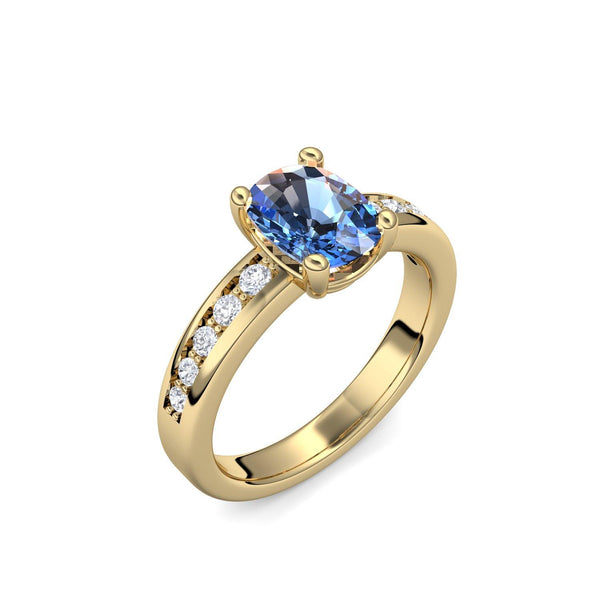 Ring Gelbgold Blautopas